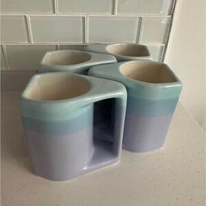 Rodolfo Padilla pottery mugs signed.